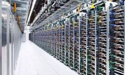 A large-scale mining farm showcasing numerous mining rigs in operation
